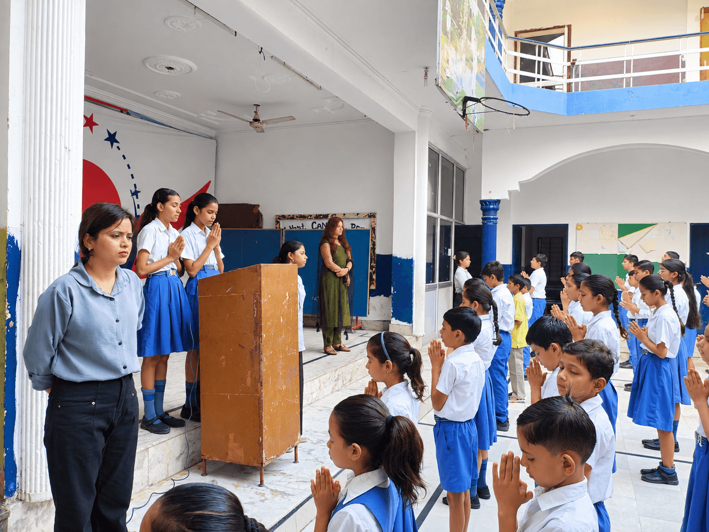 Students and teachers gathered in the school courtyard for morning prayer assembly